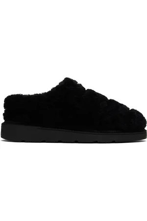 Canada Goose Mules Porteau noires en peau retournée