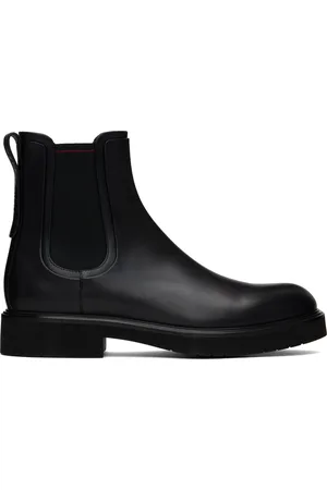 Salvatore Ferragamo Bottes chelsea noires en cuir de veau
