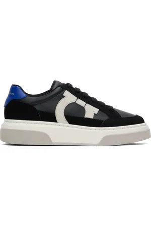 Salvatore Ferragamo Baskets basses noires à appliqué Gancini