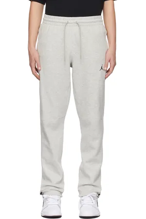 Nike Pantalon de survêtement de sport Hoop gris en molleton à logo