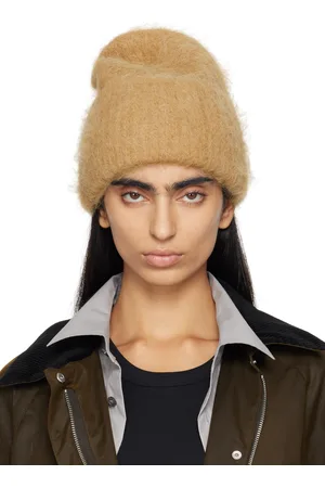 Totême Bonnet beige en tricot d
