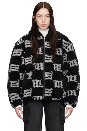 MISBHV Blouson noir en peau retournée synthétique à monogrammes