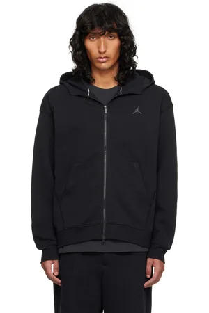 Nike Blouson de sport Hoop noir à logo