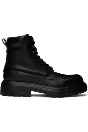 Salvatore Ferragamo Bottes militaires noires à languette rembourrée