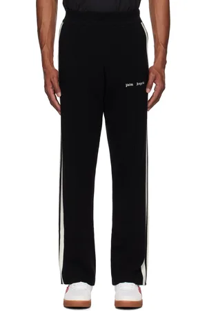 Palm Angels Pantalon de survêtement noir en tricot à logo