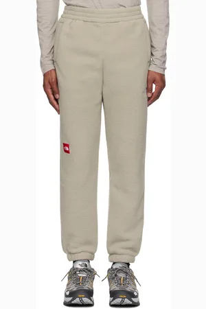 The North Face Pantalon de survêtement Fleeski beige à logos