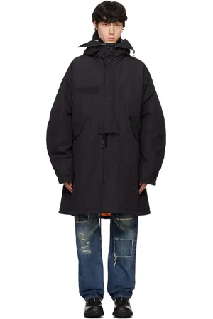 JUNYA WATANABE Manteau noir à verres édition C.P. Company