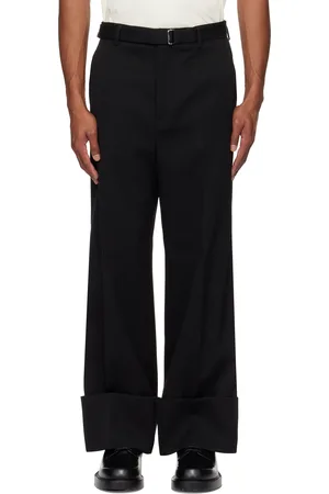 Lanvin Pantalon ample noir à revers roulés