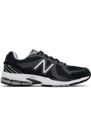 Comme des Garçons Baskets MR860 noires édition New Balance