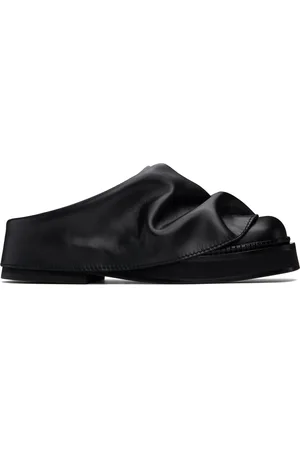 The Attico Flâneurs à enfiler de style sabot Mini Robin noirs