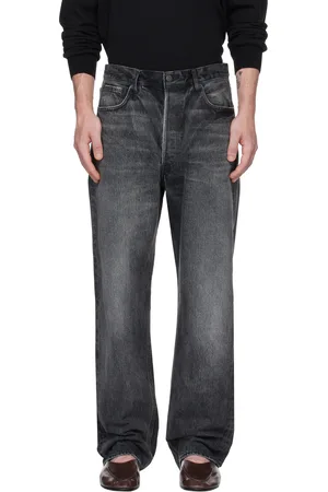 Auralee Jean ample noir en denim épais à lisières à effet délavé