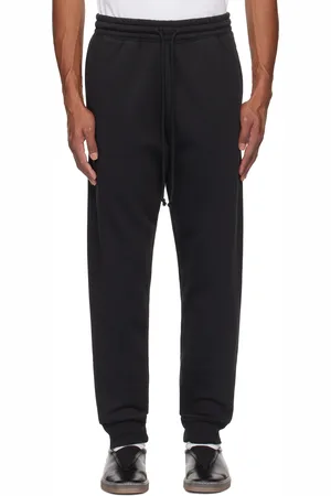 SKIMS Pantalon de survêtement fuselé noir - Fleece Lounge