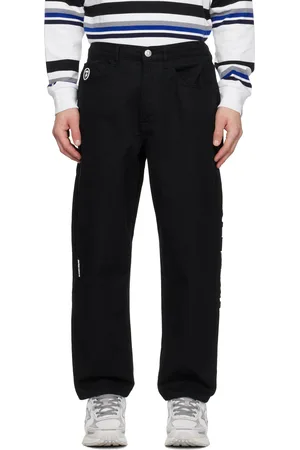 A Bathing Ape Jean noir à logo AAPE Now