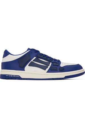 AMIRI Baskets basses blanc et bleu à appliqués Skel Top