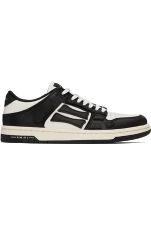 AMIRI Baskets basses blanc et noir à appliqués Skel Top