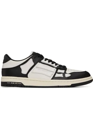 AMIRI Baskets basses blanc et noir à appliqués Skel Top