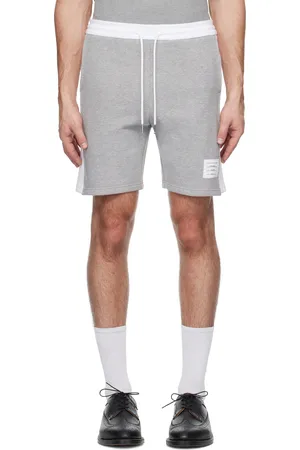 Thom Browne Short de survêtement gris en jersey bouclette à quatre rayures