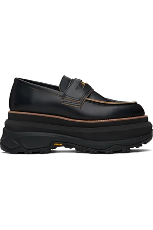 SACAI Flâneurs noirs en cuir