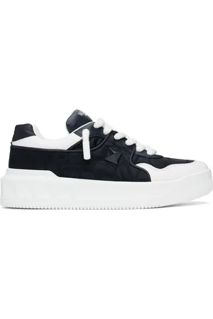 VALENTINO GARAVANI Baskets basses bleu marine et blanc à clou One Stud et à plateforme