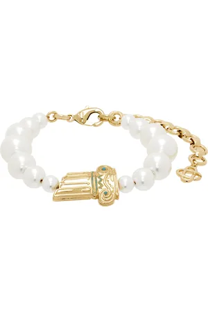 Casablanca Bracelet doré et blanc à perles artificielles et à breloque graphique
