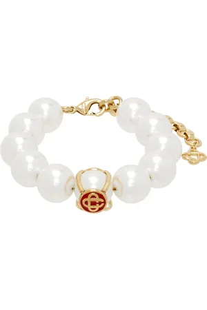 Casablanca Bracelet doré et blanc à perles artificielles et à logos