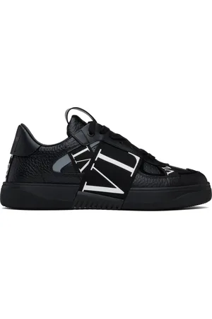 VALENTINO GARAVANI Baskets basses noires en cuir de veau à garnitures VL7N