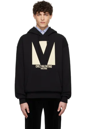 VALENTINO Pull à capuche noir en coton à image 