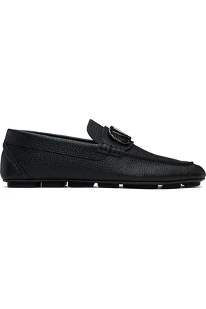 VALENTINO GARAVANI Chaussures de conduite noires en cuir de veau grainé à logo en V