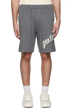 Palm Angels Short gris en tricot à logo incurvé