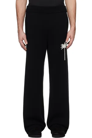 Palm Angels Pantalon de survêtement noir en tricot à logo de palmier