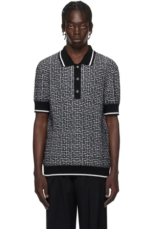 Balmain Polo noir et blanc en tricot à motif à logos PB