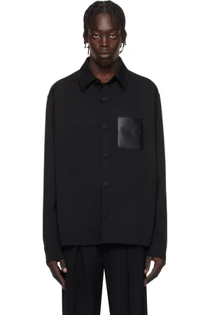 Balmain Chemise noire à poche à logo gaufré