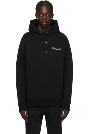 Balmain Pull à capuche noir à logo calligraphié
