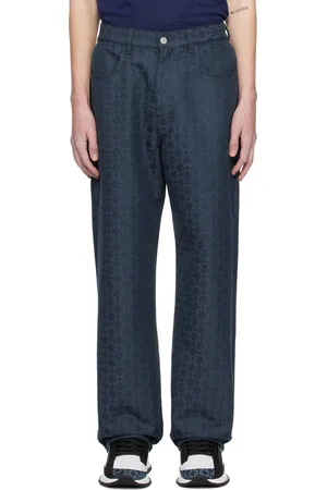 Givenchy Jean bleu marine à motif à logos en tissu jacquard