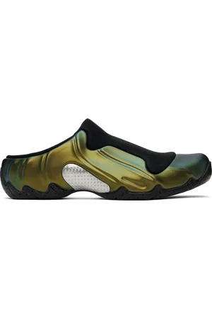 Nike Flâneurs à enfiler Clogposite noir et doré