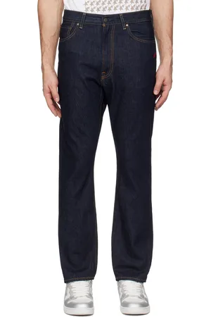 BAPE Jean bleu marine à étoiles emblématiques et à logo