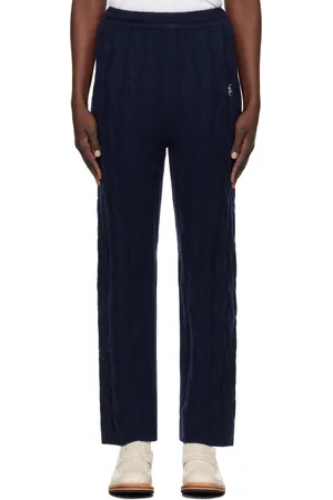 Sporty & Rich Pantalon bleu marine en tricot câblé de cachemire à logo SRC