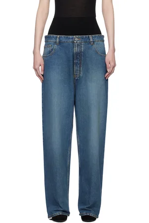 Alaïa Jean bleu à taille en tricot intégrée