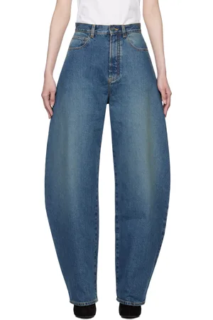 Alaïa Jean bleu à coutures extérieures incurvées