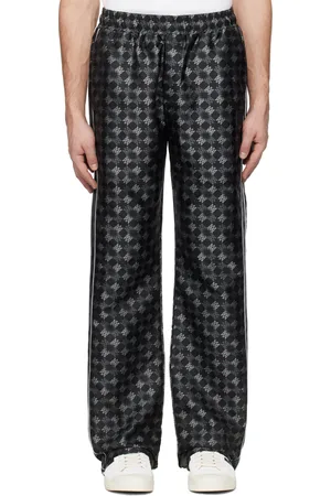 AMIRI Pantalon de survêtement noir à motif à quadrigrammes
