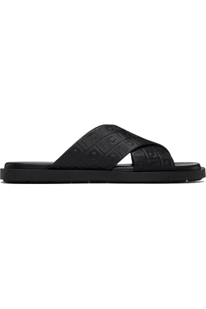 Salvatore Ferragamo Sandales noires à monogrammes