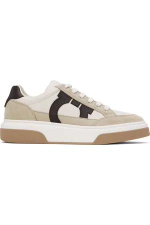 Salvatore Ferragamo Baskets basses beiges à appliqué Gancini