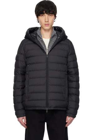 Moncler Blouson court Chevrerie noir rembourré en duvet à capuche