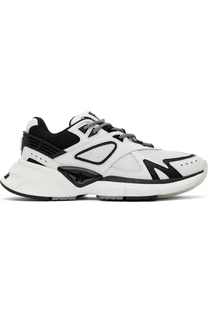 AMIRI Baskets de course blanc et noir à monogrammes