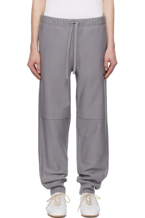 Carhartt Pantalon de survêtement gris à logo American Script
