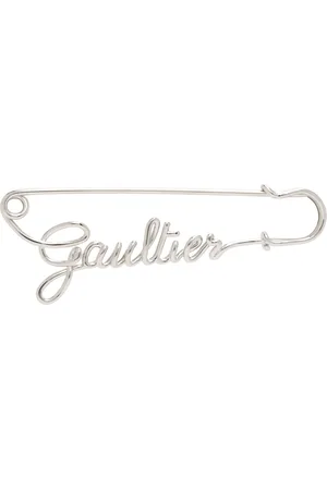 Jean Paul Gaultier Broche argentée à logo