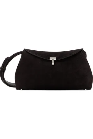 Totême Pochette brune en suède à verrou tournant