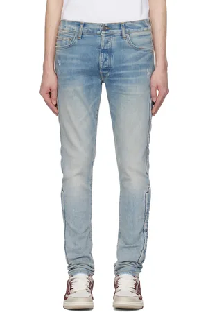 AMIRI Jean skinny bleu à appliqué d