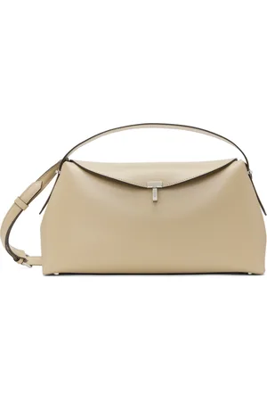 Totême Sac à main beige en cuir à verrou tournant