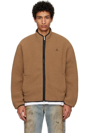 Nike Blouson brun en molleton à poils longs